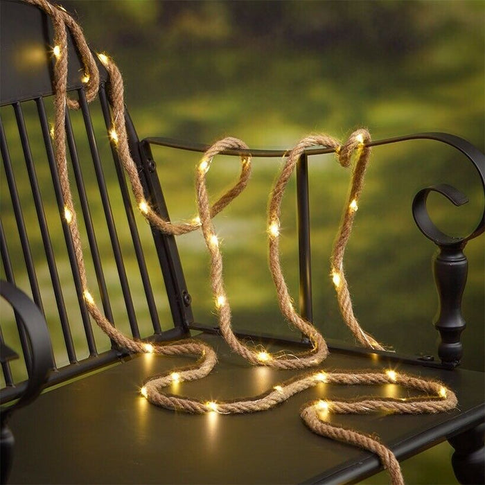 Corda Solar Rope String Lights — hemp rope solar string lights glowing warm on a garden chair at dusk