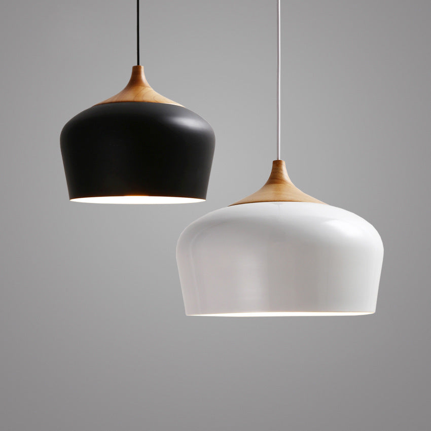 Hinoki Wood Pendant Light — dome pendant light with natural wood top hanging over a dining nook