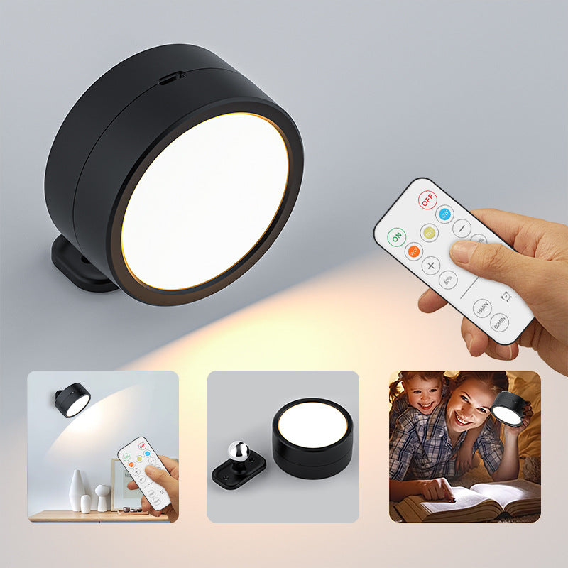 Orbit Rechargeable Wall Light — cordless round wall light with rotatable head and remote control by a bedside