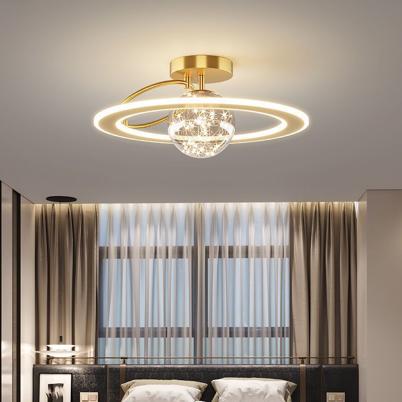 Aurora Starlit LED Ceiling Light — gold halo LED ceiling light with crystal accents glowing warmly in a bedroom