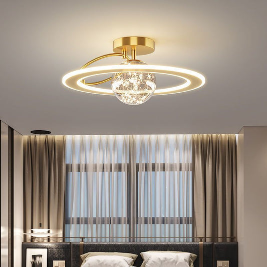 Aurora Starlit LED Ceiling Light — gold halo LED ceiling light with crystal accents glowing warmly in a bedroom